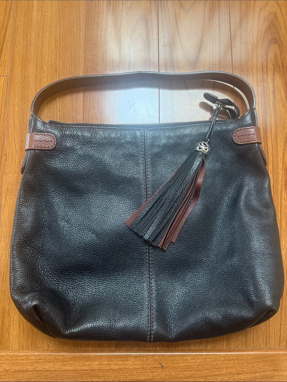 Brighton Black Leather Shoulder Bag with Brown Accents and Tassel